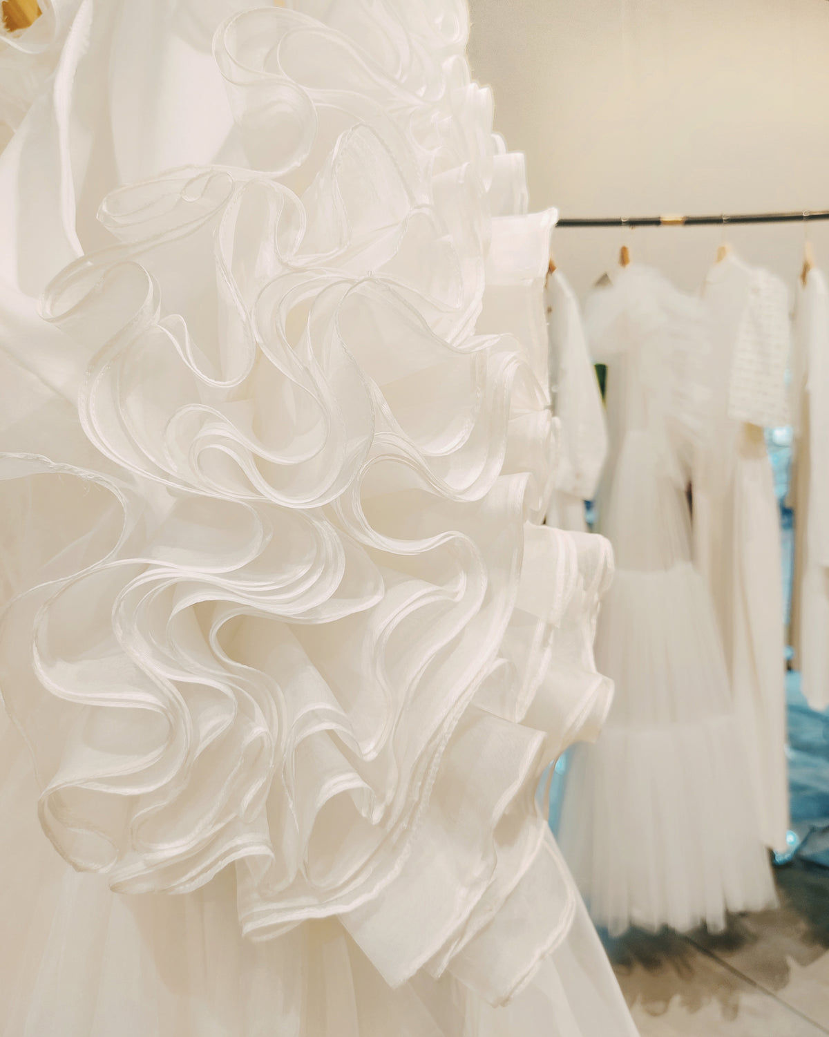 White organza ruffled gown