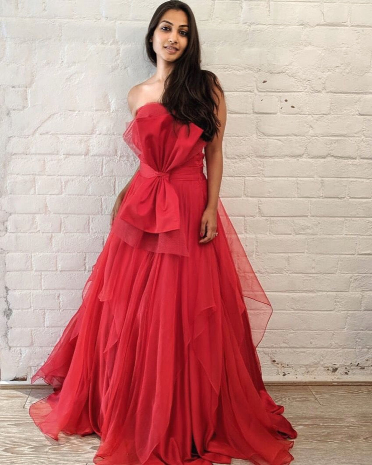 Red organza bow gown