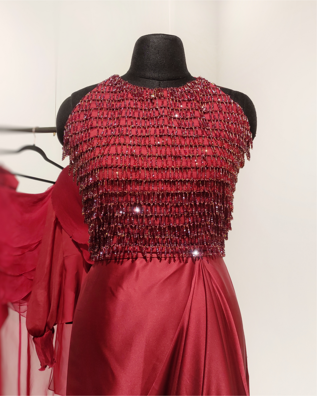 Red dazzle blouse with pleated cape set