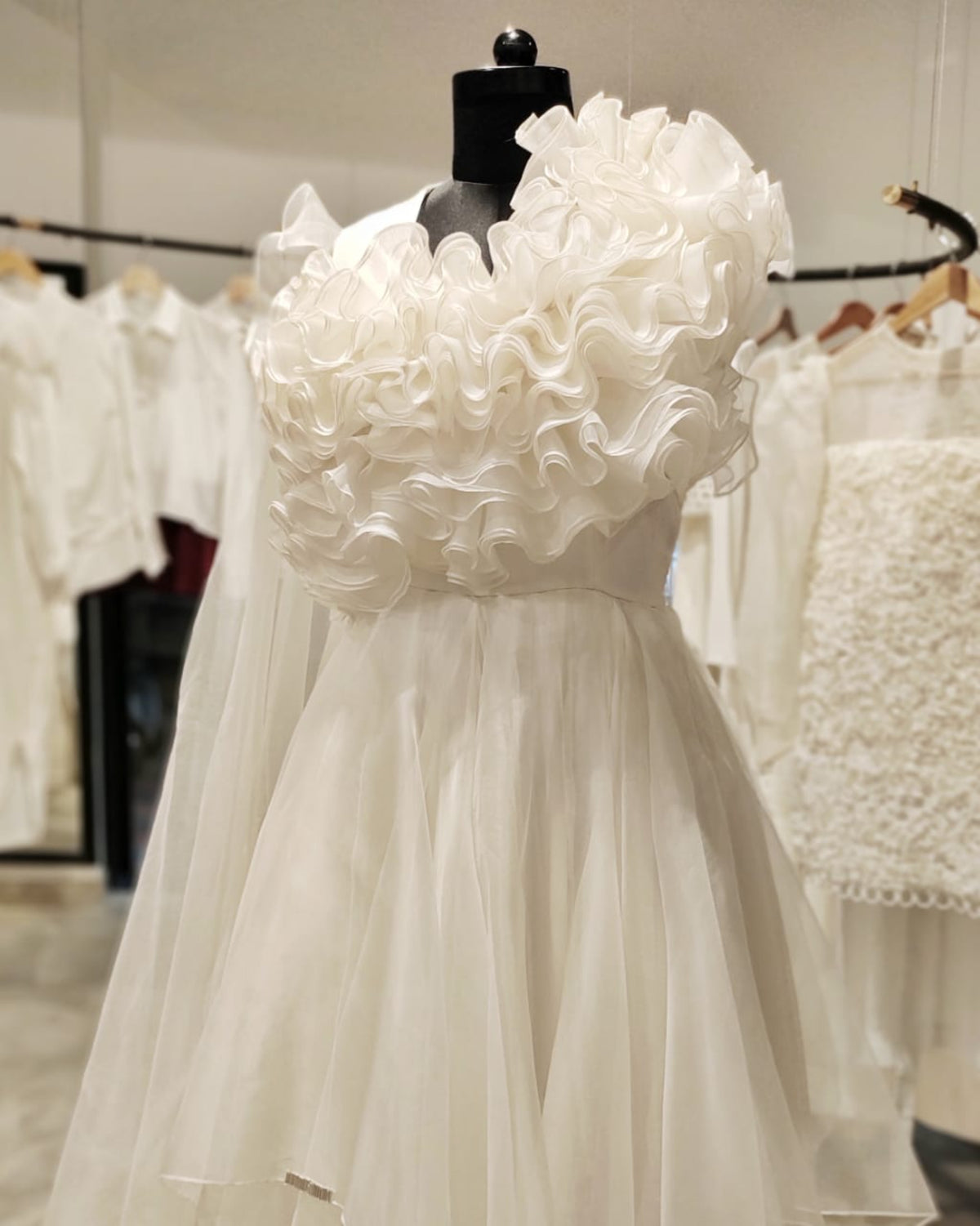 White organza ruffled gown